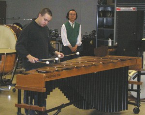 Tomek Arnold (1st-year international percussion student from Poland) performs movement 1 of "TORSE III" by Miyoshi, as Professor Kazunori Meguro of the Showa Academy observes.