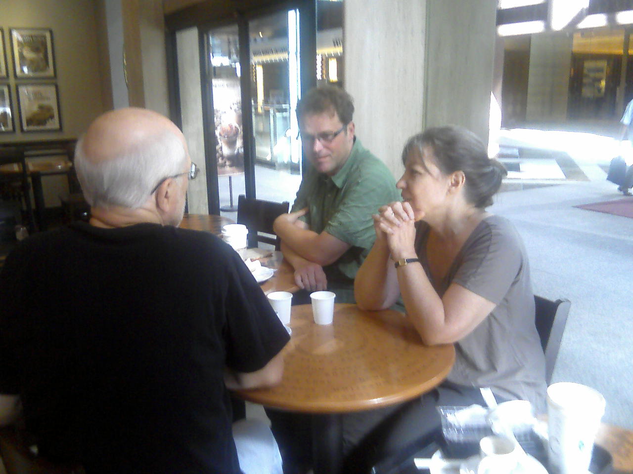 Discussing important NEXUS business at Starbucks office - "where to have lunch?"