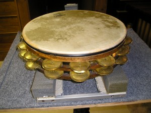 Tambourine positioned on Cradle