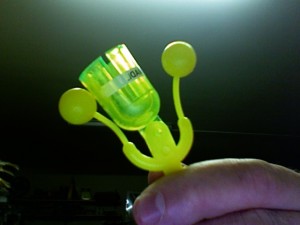 A Toy Plastic Rattle used as one of the two "Cricket Callers" in John Cage's "Third Construction"