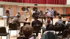 "Three Rituals on Metal" is coached by Amadinda musicians, Aurél Holló (standing far right) and Zoltan Rácz (seated on left)