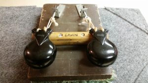 This is a view from the front of the castanet machine I made in high school. The castanets are the standard bakelite ones from the Ludwig catalog of the 1960s. The rail is a 1-1/4-inch diameter pine dowel.
