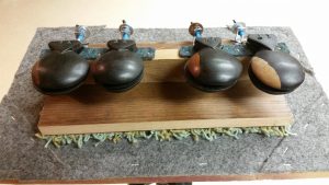The four pair of high-sounding castanets on this double machine are Spanish. They were recently purchased in a local antique shop.