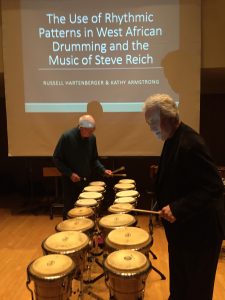 Bob Becker and Garry Kvistad tuning the bongos for a sixteen drum performance of Steve Reich’s Drumming, Part I at the University of Toronto, Dec. 1, 2016. Photo: Russell Hartenberger. 