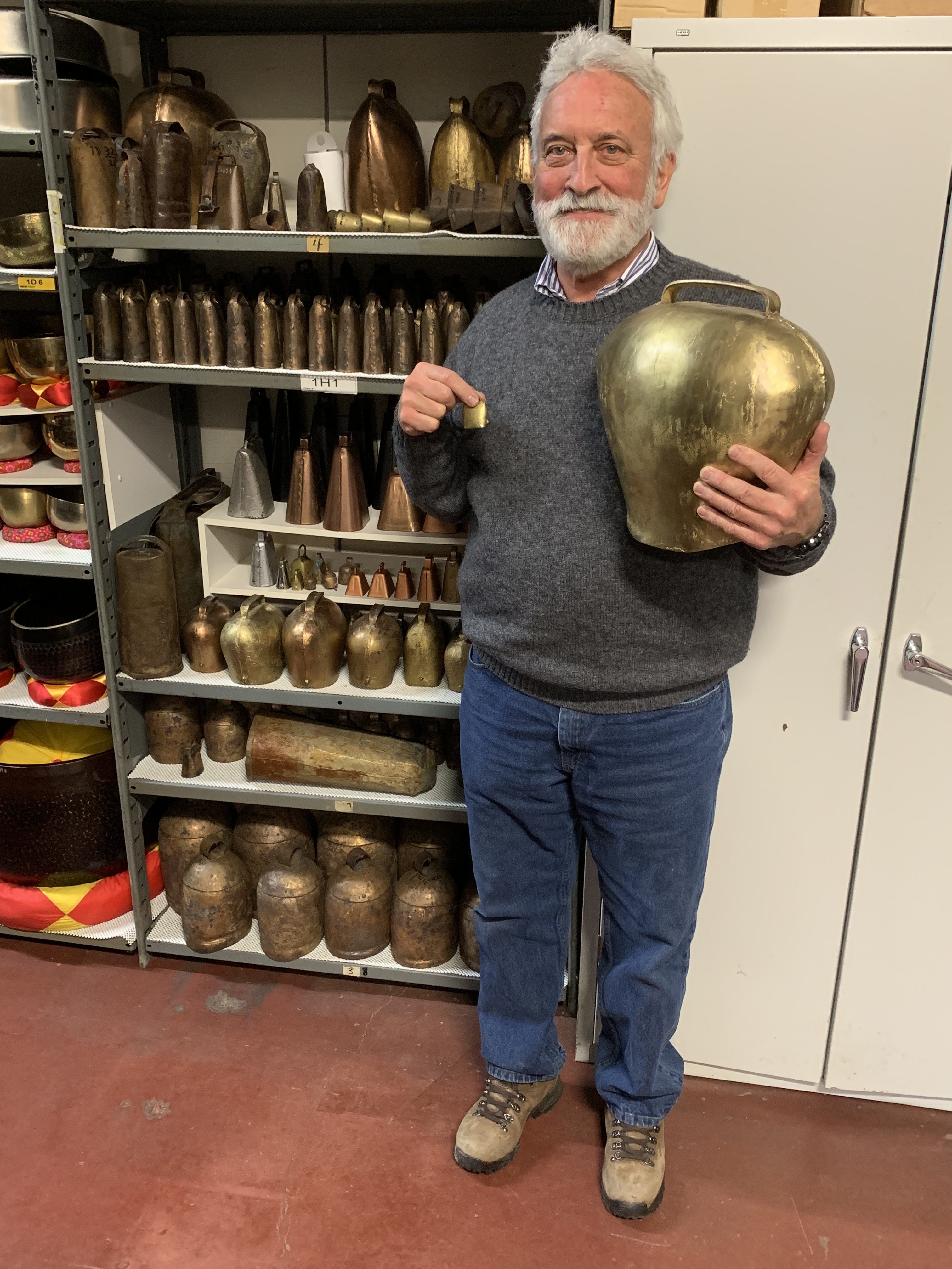 Garry in front of his cowbell collection – Diane says “no more cowbells!